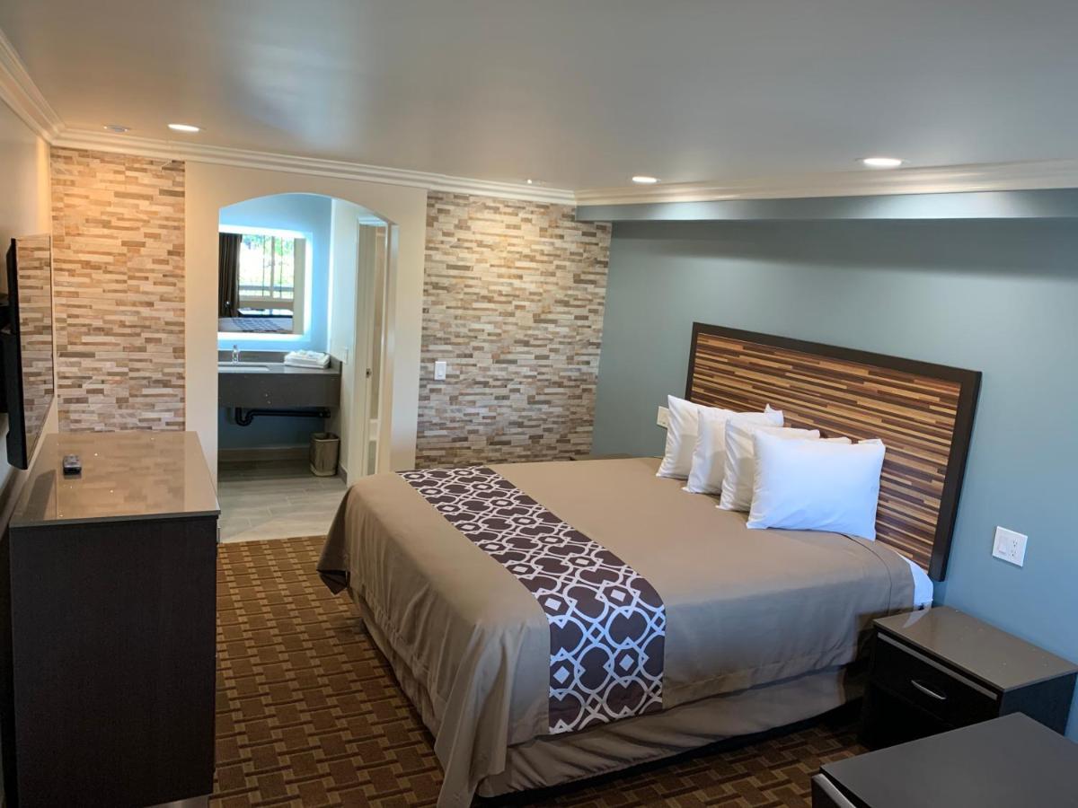Industry Inn & Suites Ла-Пуэнте Экстерьер фото